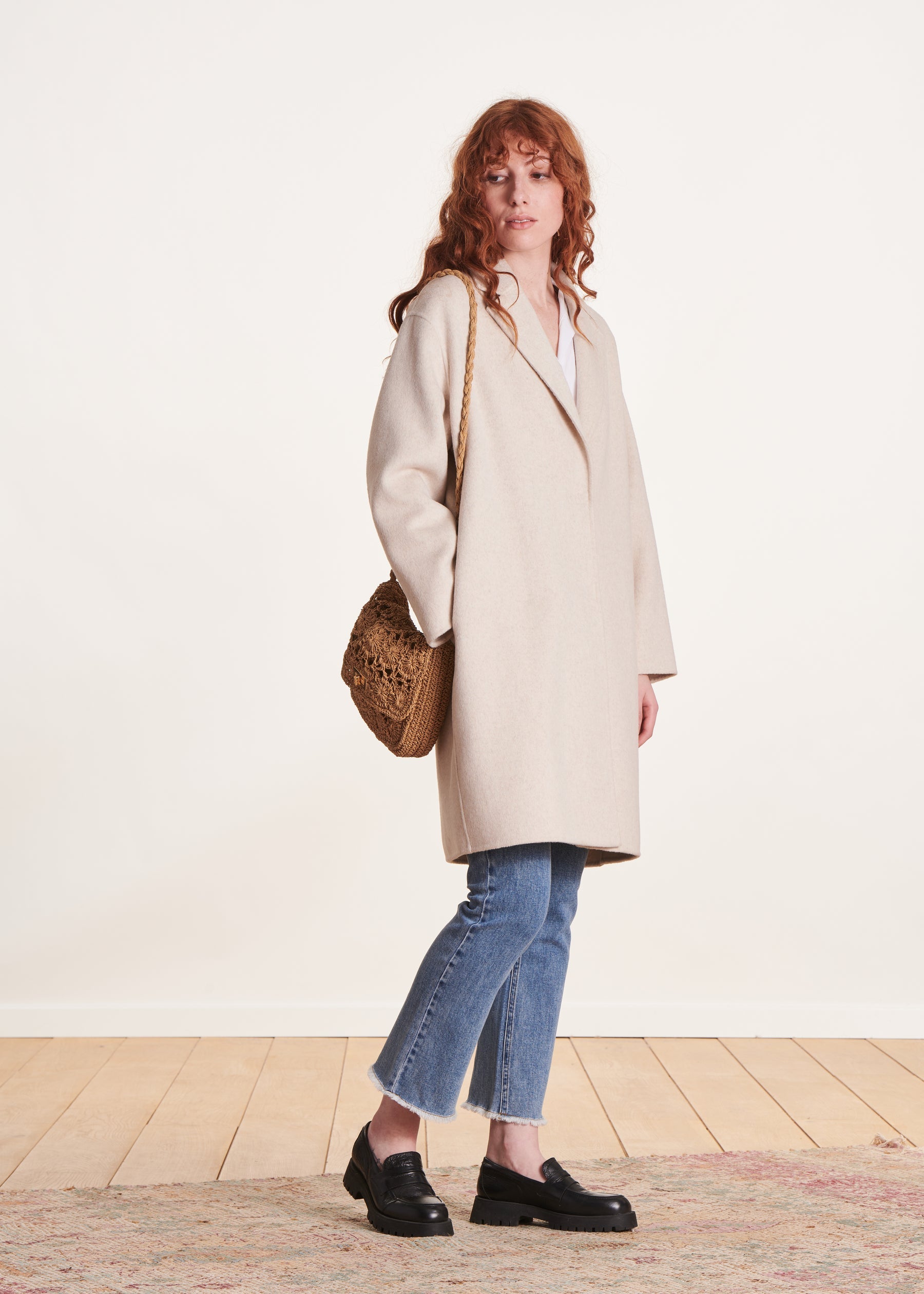 Manteau mi-long écru en lainage