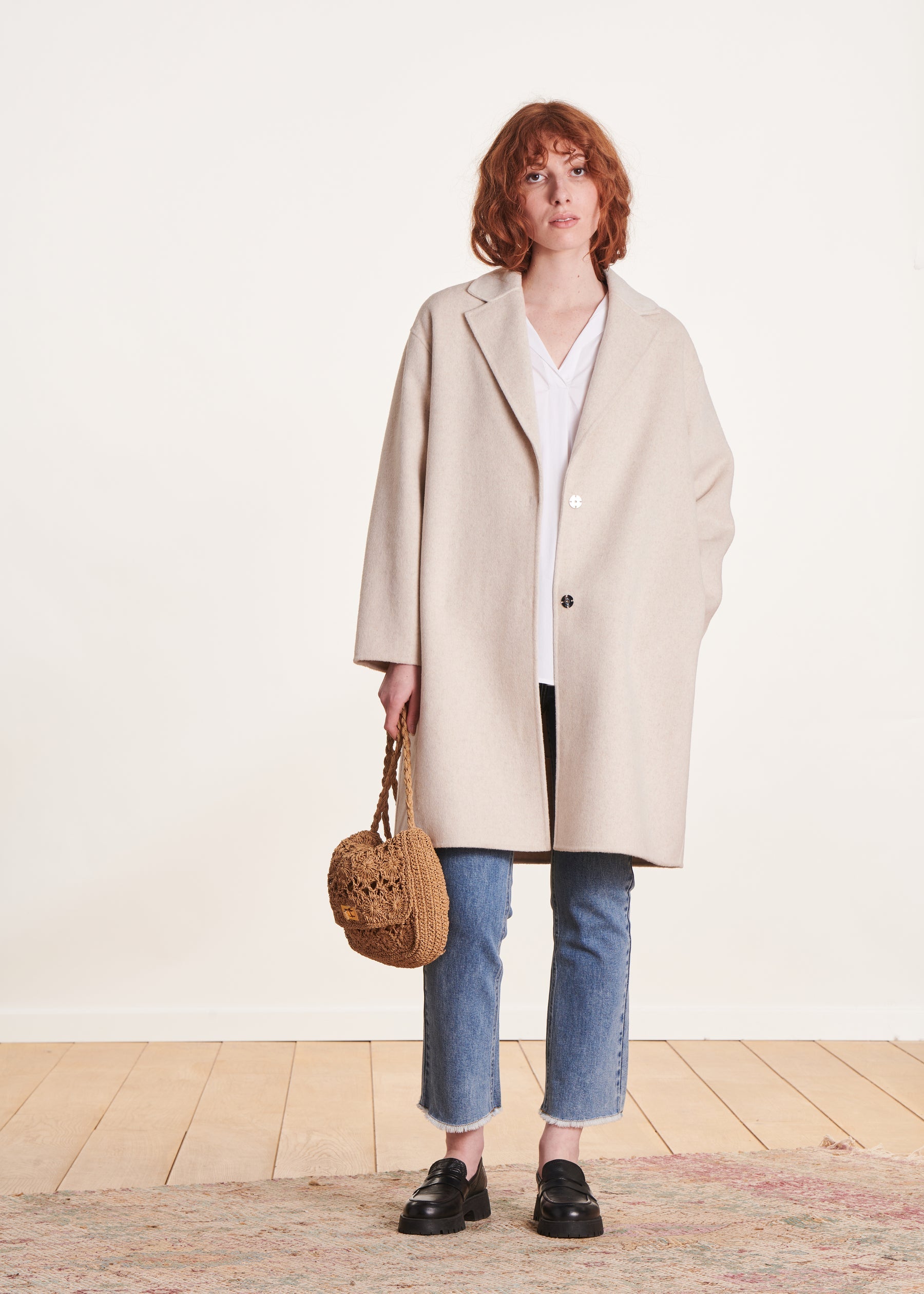 Manteau mi-long écru en lainage