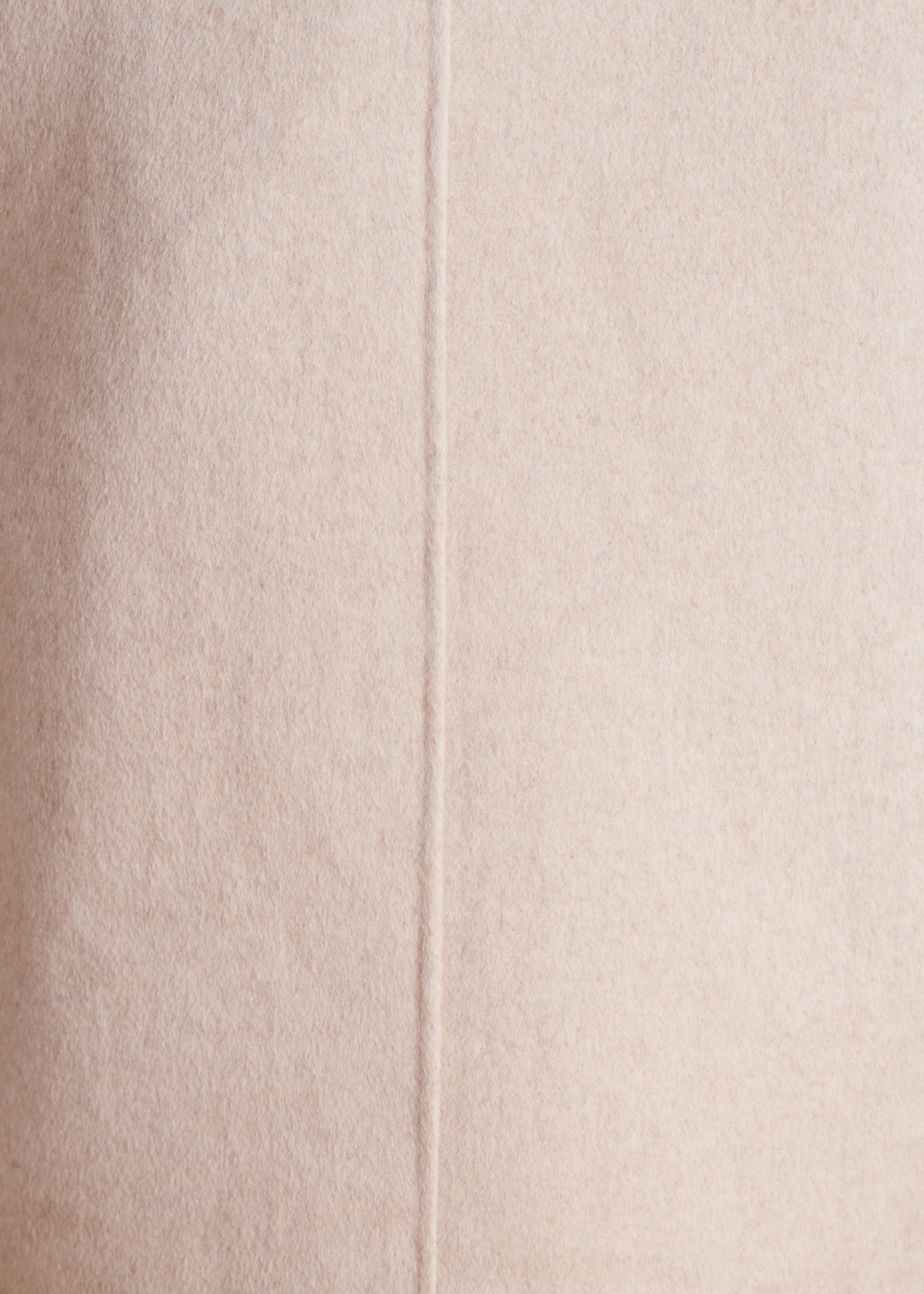 Manteau mi-long écru en lainage