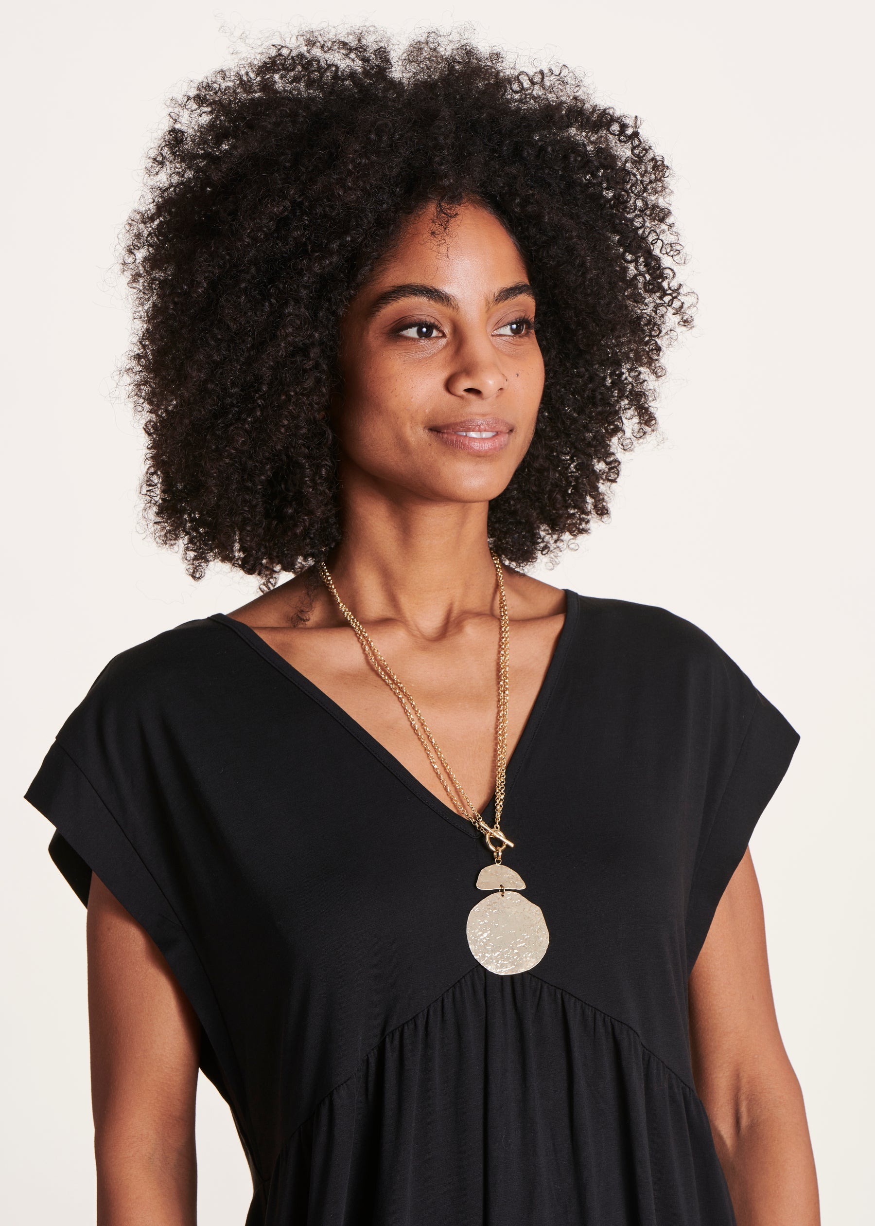 Collier sautoir pièce martelée doré