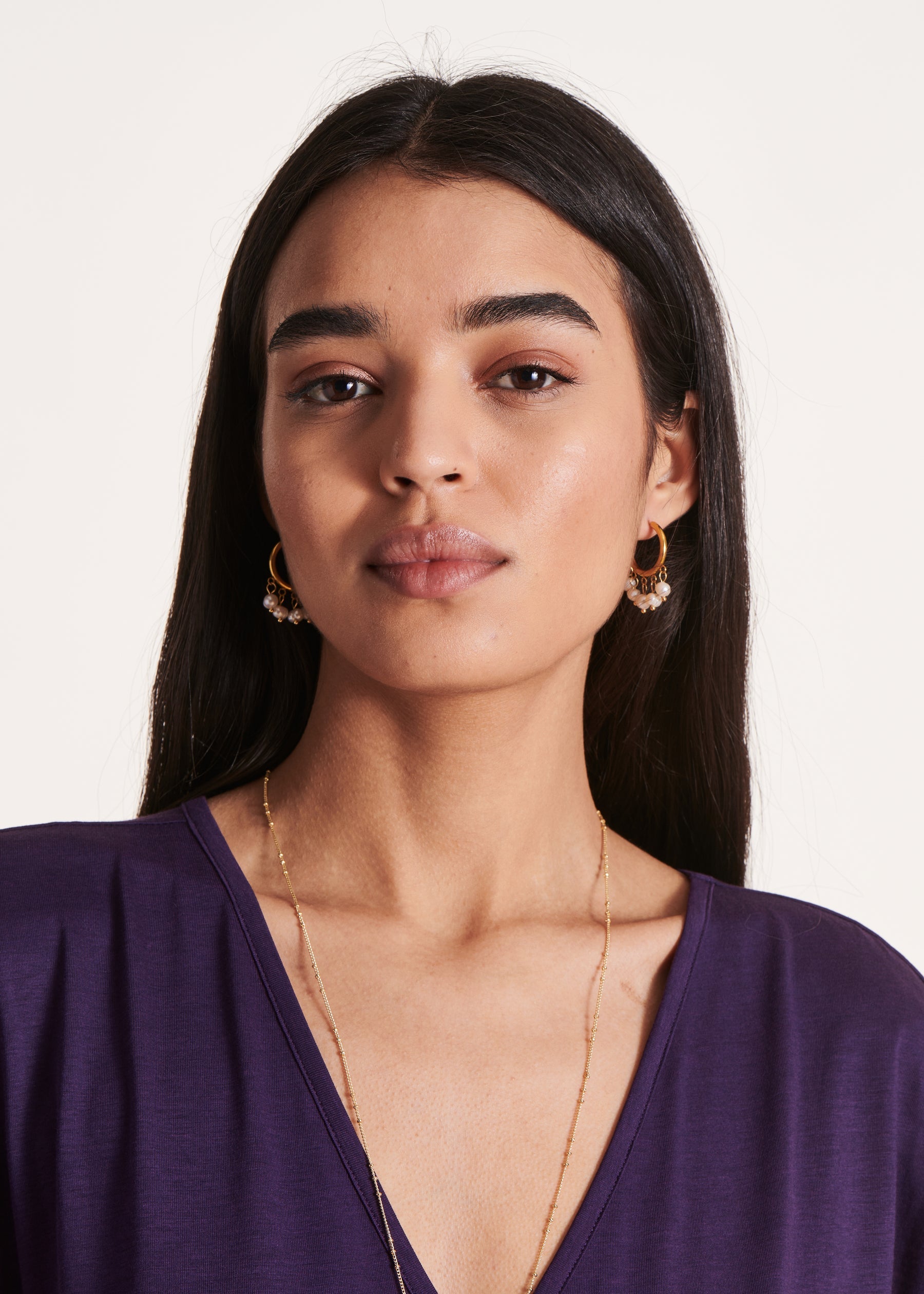 Boucles d'oreilles créoles dorées avec perles