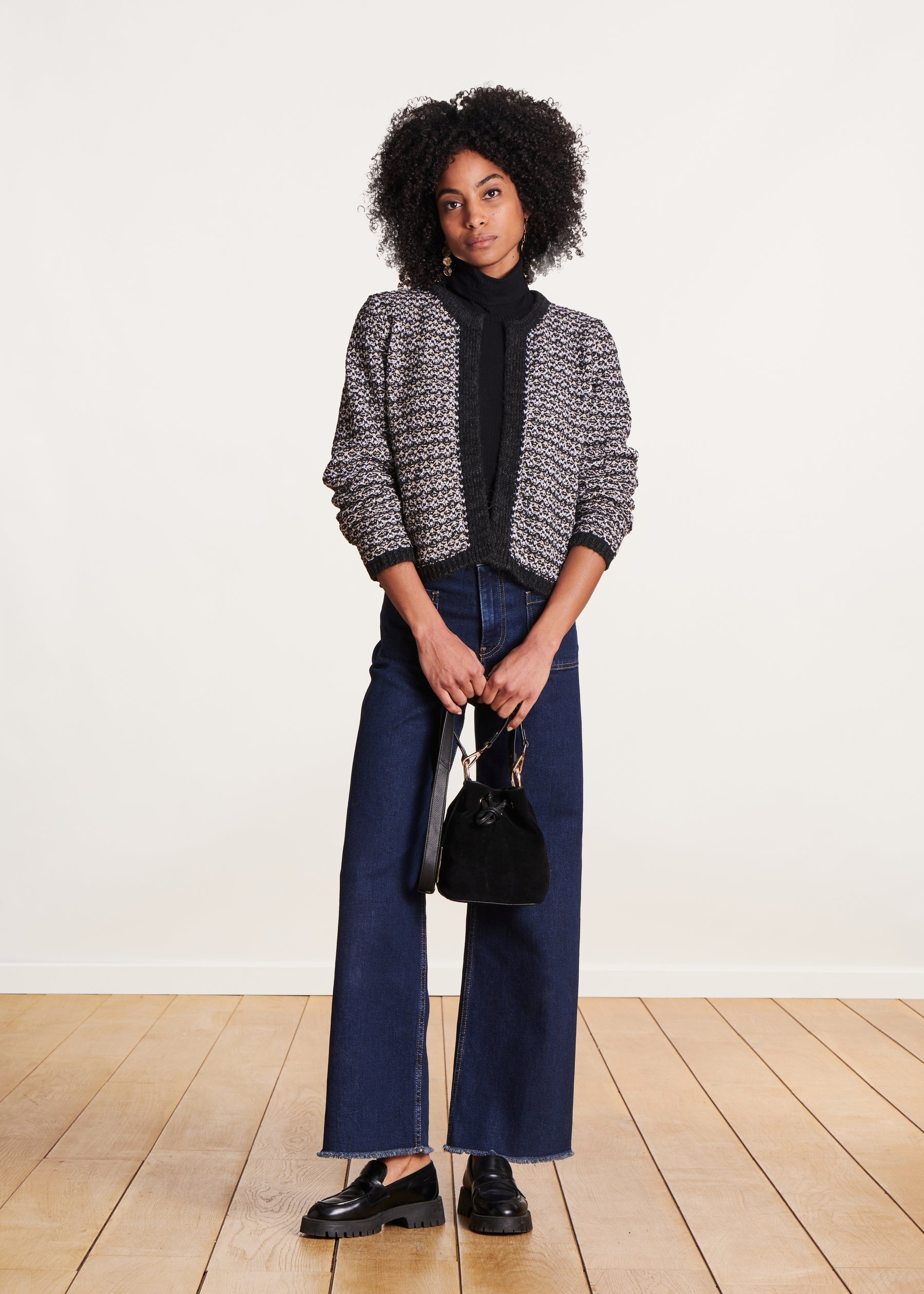 Gilet noir en maille irisée encolure ronde