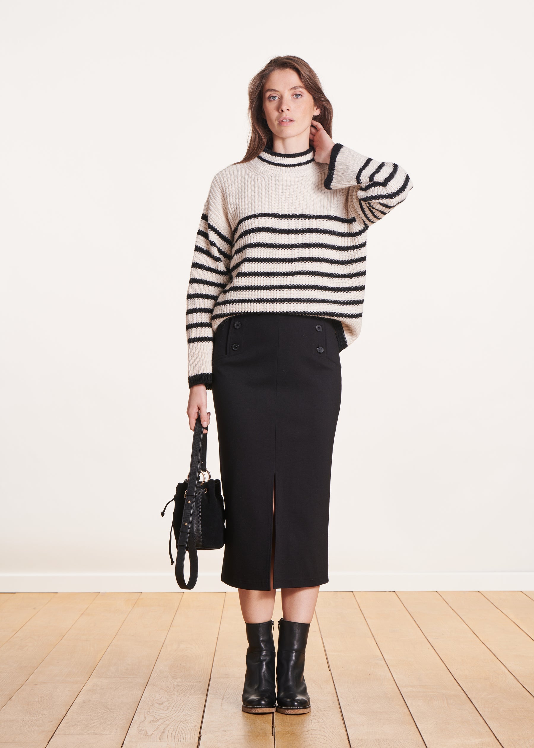 Jupe mi-longue droite à pont noire en jersey