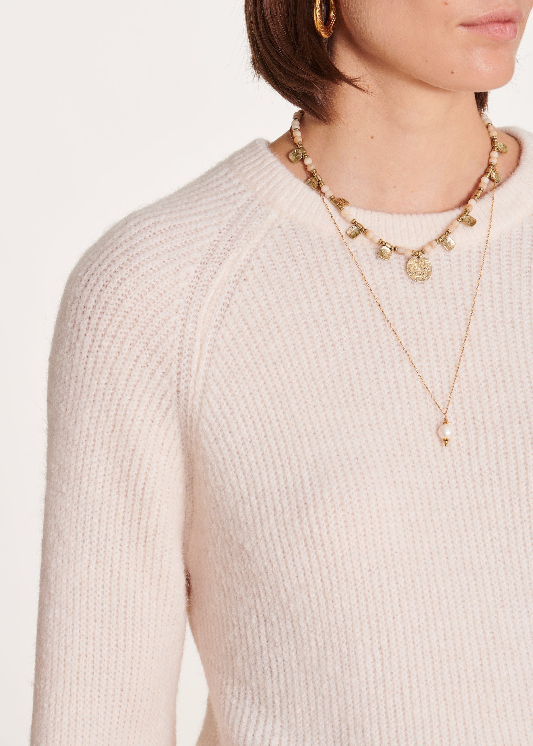 Pull écru ample tricotage à côtes