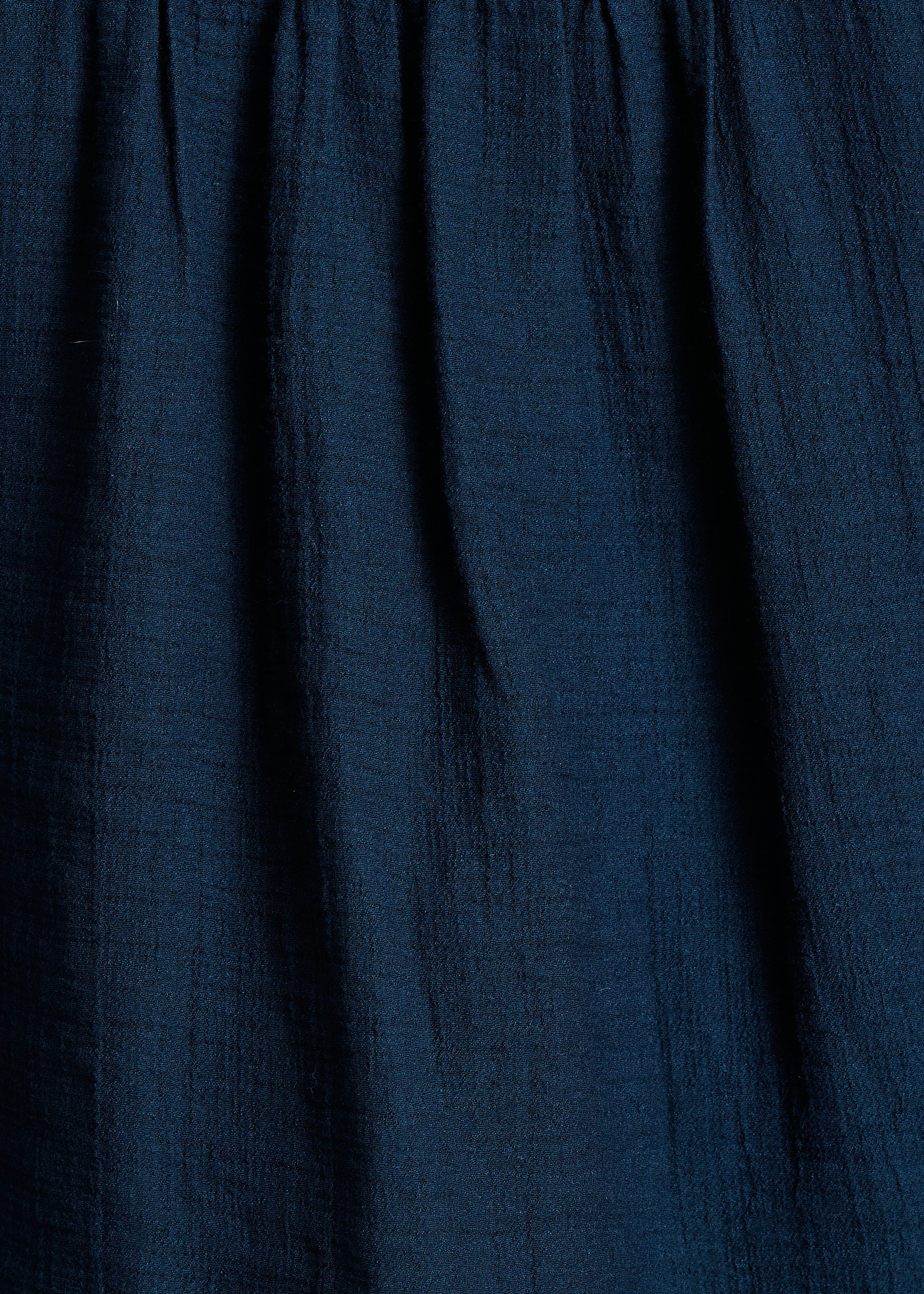 Top bleu pétrole encolure tunisienne